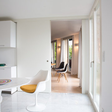 Modern White Kitchen with touches of color, by Architect Your Home Portugal