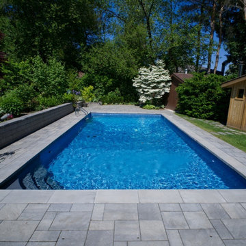 Elevating the Backyard with Interlocking Pool Deck and Garden Oasis