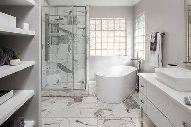 Example of a mid-sized transitional bathroom design in Dallas