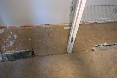 Patched Carpet where wall was removed