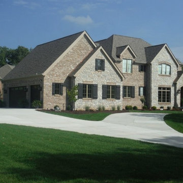 Khaki Brown Lap Siding | Pebblestone Clay Aluminum Soffit & Fascia | Ladue, MO.
