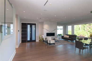 Example of a trendy family room design in Vancouver