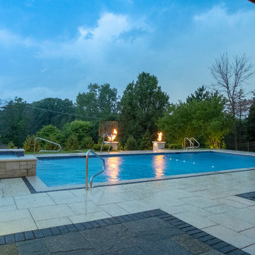 Burr Ridge Lap Pool with Raised Hot Tub and Waterfall