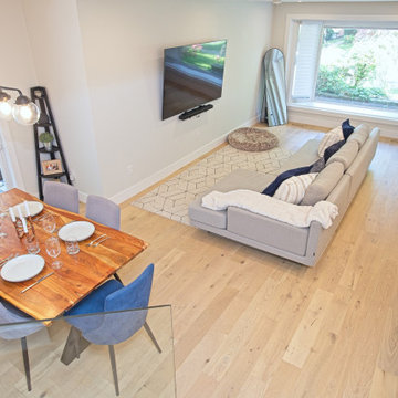 Connected Living and Dining Room with Pale Wood Floors | North York