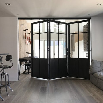 Modern Steel Fireplace and Bi-folding Door System