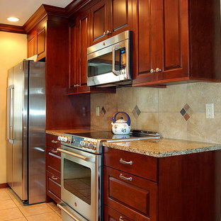 Large traditional kitchen pantry designs - Large elegant u-shaped ceramic floor kitchen pantry photo in Little Rock with ceramic backsplash, stainless steel appliances, a single-bowl sink, flat-panel cabinets, medium tone wood cabinets, granite countertops, multicolored backsplash and an island