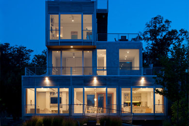 Inspiration for a modern exterior in DC Metro with wood siding.