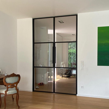 Großzügige Zweiflüglige Lofttür mit beeindruckenden Glasfeldern