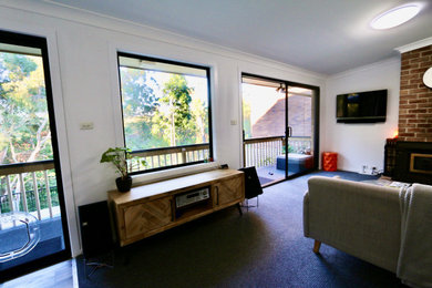 Photo of a contemporary home design in Sydney.