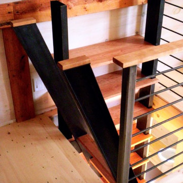 Cherry and steel stairs and bookcase