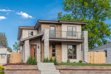 Example of a transitional exterior home design in Denver