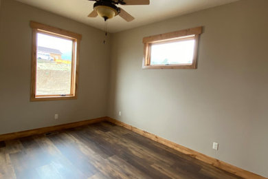Example of a mountain style home design design in Denver