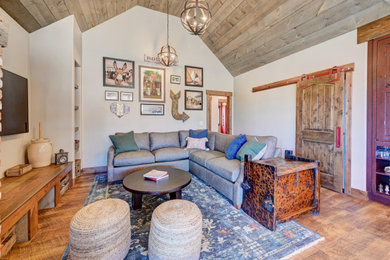 Mountain style family room photo in Denver