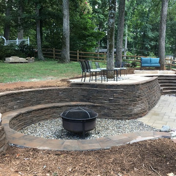 Multi-Level Paver Patio with Staircase and Seating