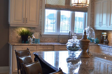 Example of a transitional kitchen design in Toronto