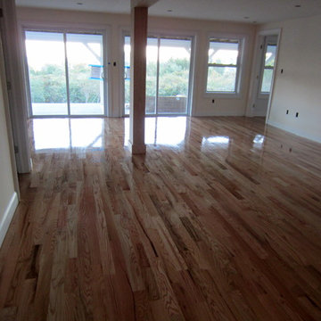 MONTAUK NEW CONSTRUCTION: 3 1/4" #1 RED OAK INSTALLED AND FINISHED NATURAL!