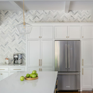 A Bold, Minimal Kitchen With Asian Statuary Herringbone Tile