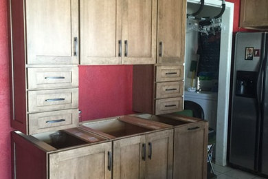 Large trendy kitchen photo in Oklahoma City with shaker cabinets, medium tone wood cabinets and stainless steel appliances