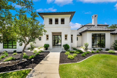 Inspiration for a transitional exterior home remodel in Austin
