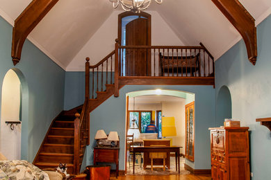 Example of a country family room design in Chicago