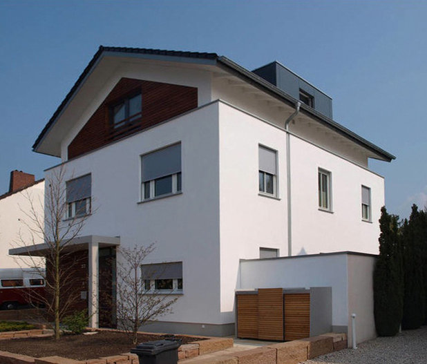Modern Häuser by xtraplan architekten + innenarchitekten