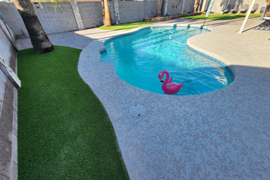 Inspiration for a 1950s pool remodel in Phoenix
