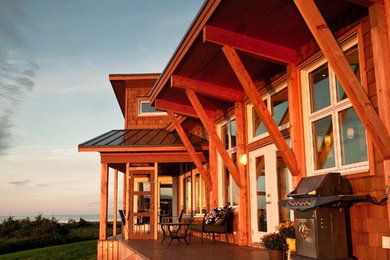 Modern brown two-story wood exterior home idea in Vancouver