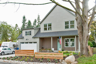 Inspiration for a large country gray two-story concrete fiberboard exterior home remodel in Seattle