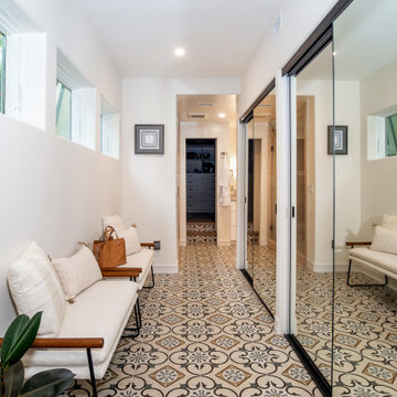 Closet Hallway with Patterned Tile Floor and Mirrored Sliding Doors | San Diego,