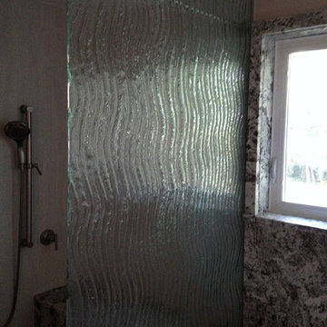 Cascading water shower wall