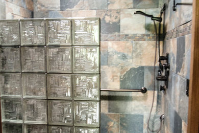 Mid-sized mountain style multicolored tile and slate tile slate floor and multicolored floor bathroom photo in Other with black walls
