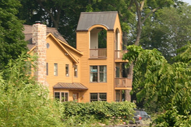 Example of a transitional home design design in Philadelphia
