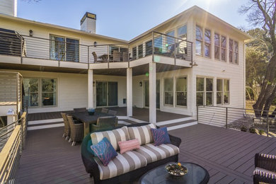 Inspiration for a large contemporary backyard deck remodel in Austin with no cover