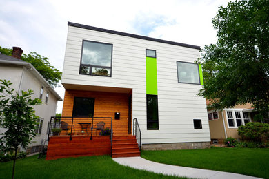Modern two-storey white exterior in Minneapolis with concrete fiberboard siding.