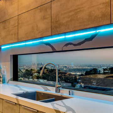 Undercabinet LED and City Lights Behind the Sink at Night