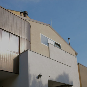 Riqualificazione di edificio bifamiliare