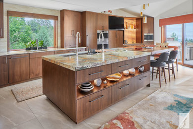 Inspiration for a large modern l-shaped porcelain tile and beige floor eat-in kitchen remodel in Denver with an undermount sink, flat-panel cabinets, medium tone wood cabinets, granite countertops, beige backsplash, porcelain backsplash, stainless steel appliances, an island and multicolored countertops