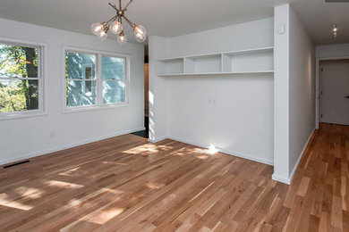 Example of a minimalist bedroom design in Other