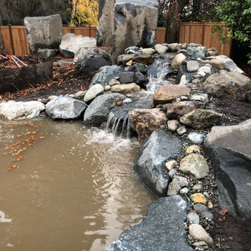 Bocce Ball Court, Pond, Granite Rocks and Dimensonal Flagstone