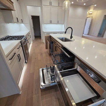 Custom cabinetry and appliances in kitchen