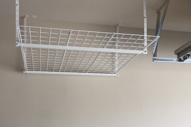 Install storage shelves from ceiling in garage