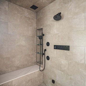 Bathroom Remodel in Sterling, VA Tub, glass shower, double vanity, stone wall