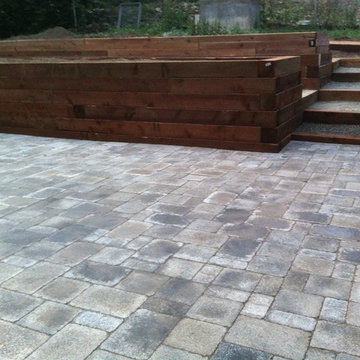 Garden planters over paver patio