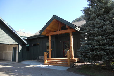 Example of a farmhouse entryway design in Other
