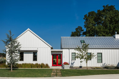 Farmhouse exterior home idea in Seattle