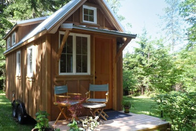 Small traditional backyard patio in Portland with decking and a roof extension.