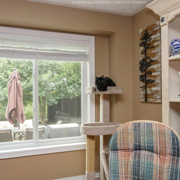 New White Sliding Window in Lovely Living Room - Renewal by Andersen Greater Tor