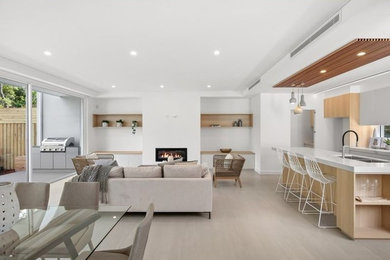 This is an example of a contemporary living room in Sydney.