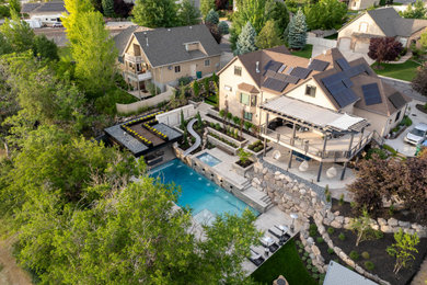Example of a transitional home design design in Salt Lake City