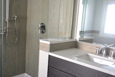 Example of a bathroom design in Toronto with dark wood cabinets